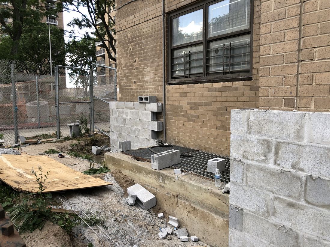 According to residents, the areas around the O'Dwyer buildings have been left untouched for months, with garbage building up inside the fenced off areas, July 6th, 2022